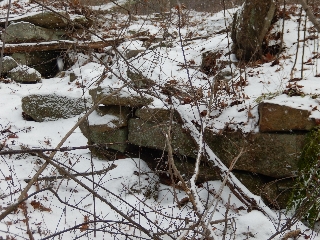 Remains of old dry bridge at Ellis-Salisbury Farmstead in Hassanamesit Woods